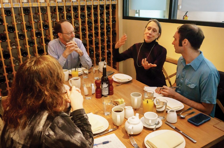 Artistic directors Bob Wiemken, second from left, and Joan Kimball in a meeting with choreographer Christopher Williams and executive director Shannon Cline. 