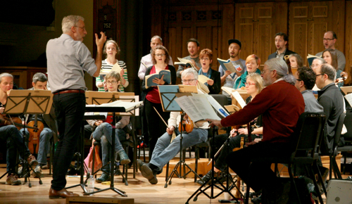 Taurins leads a rehearsal with Tafelmusik Baroque Orchestra and Chamber Choir. (Photo by Andrew Eusebio)