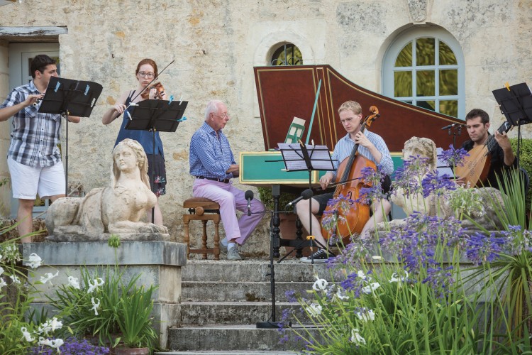 William Christie, center, performs with Joseph Monticello, Augusta McKay Lodge, Alexander Nicholls, and Thibaut Roussel at his estate in Thiré. Photo by David Fugère