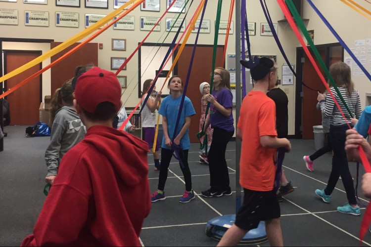 St. George Elementary students dance the maypole in rehearsal.