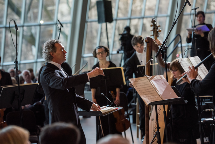 Harry Christophers leads the Handel and Haydn Society in Monteverdi's Vespers of 1610 in the Temple of Dendur at the Metropolitan Museum of Art. (Photo by Stephanie Berger) 