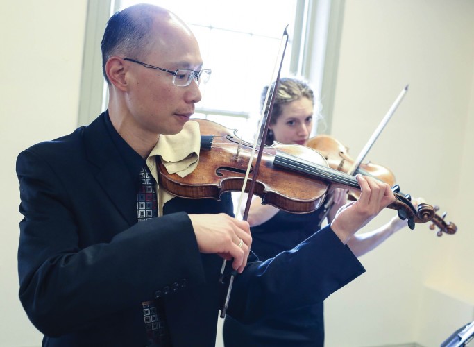 Tempesta di Mare concertmaster Emlyn Ngai and violinist Karina Schmitz. Photo by Mighty Engine