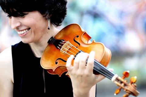 Violinist Amandine Beyer with her violin
