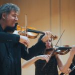 Boulder Bach Festival Goes Beyond Bach Violinist Zachary Carrettín, artistic and executive director of the Boulder Bach Festival, in performance with violinists Magee Capsouto and Brune Macary. <br> Photo by Mineral Sound)
Credit: Mineral Soundviolin—with fellowship artist Dr. Magee Capsouto (violin) and BBF core member, Brune Macary (violin)
Credit: Mineral Sound