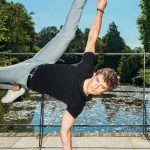 Jakub Józef Orliński performs a one-hand handstand